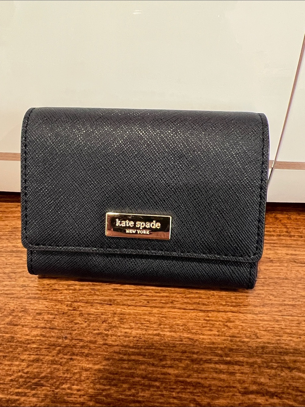 kate spade Black Textured faux Leather Fold card holder with Gold Logo Plaque
